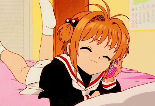 A gif of cardcaptor sakura talking on the phone
